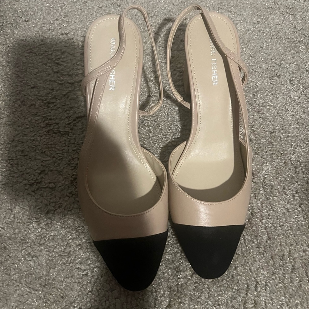 Never worn pumps.